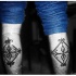 Tatuaggio tribale sulle gambe