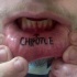 Tatuaje en el labio, chipotle, flecha
