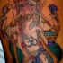 tatuaje del rey de ganesha en oro