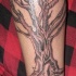Grazioso tatuaggio sulla gamba l'albero senza vita