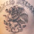 el tatuaje de la aguila con una serpiente de la bandera mexicana
