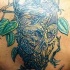 tatuaje de monstruo antárbol de madera