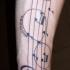 simbolo di infinita' sulle note musicsle tatuaggio
