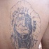 Vecchio capopopolo indiano tatuaggio sulla schiena