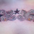 Tre stelle con ornamento tatuaggio