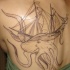 Volante navile e mostro marino tatuaggio