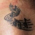Tatuaggio di note e cose musicale