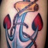 Tatuaje de ancla en color