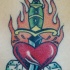Tatuaje clásico daga en corazón herido