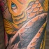 Tatuaje de carpa koi color dorado