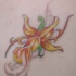 Orchidea gialla tatuaggio