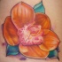 Orchidea aranciata tatuaggio