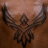 el tatuaje sencillo tribal de la ave fenix