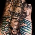 Nave di pirata e cranio classico tatuaggio