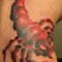Red scorpion tattoo