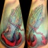 Tatouage mains de zombie en prière avec chapelet