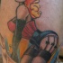 el tatuaje pin up de una chica guera