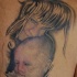 Tatuaje retrato de madre y hijo