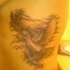 Tatuaggio non colorato sul fianco gli uccelli