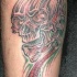 Calavera biomecánica tatuaje en color
