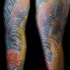 Peces koi tatuaje en la manga entera