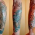 Peces koi tatuaje en color