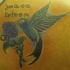 tatuaje conmemorial de pequeño colibrí