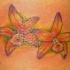 Piccola gialla orchidea tatuaggio