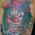 tatuaje de payaso  fumando porro
