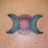 Sol con luna creciente tatuaje en color