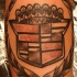 Gran tatuaje con el logo de Cadillac