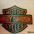 Logo de Harley davidson tatuaje en color
