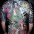 Impressionante tatuaggio combattimento in stile asiatico