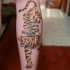 Asian crawling tiger tattoo