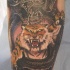 Tigre y dragón negro tatuaje en color