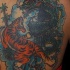 Batalla entre tigre y dragón tatuaje en color