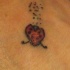 Mariquita tatuaje en el pie