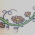 el tatuaje de la traceria florar en forma de brazalete hecho en color