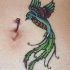 maggico uccello con piercing tatuaggio
