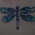 libellula blu tribale tatuaggio