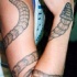 Tatouage manche serpent