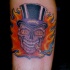 Calavera con cigarillo y sombrero de copa tatuaje en color