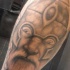 Tatuaje la cabeza del viking con los ojos atemorizado