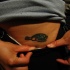 Tatuaggio piccolo sul fianco la tartaruga verde