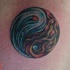 Tatuaje yin yang - contraste entre agua y fuego