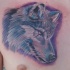 Tatouage coloré de la tête de loup