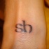 Tatuaje en la muñeca Sh