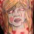 Tatuaje mujer-zombi llorando con una inscripcón debajo