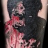 Tatuaje la imagen del zombi en negro y rojo
