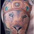 corona sulla testa di leone tatuaggio